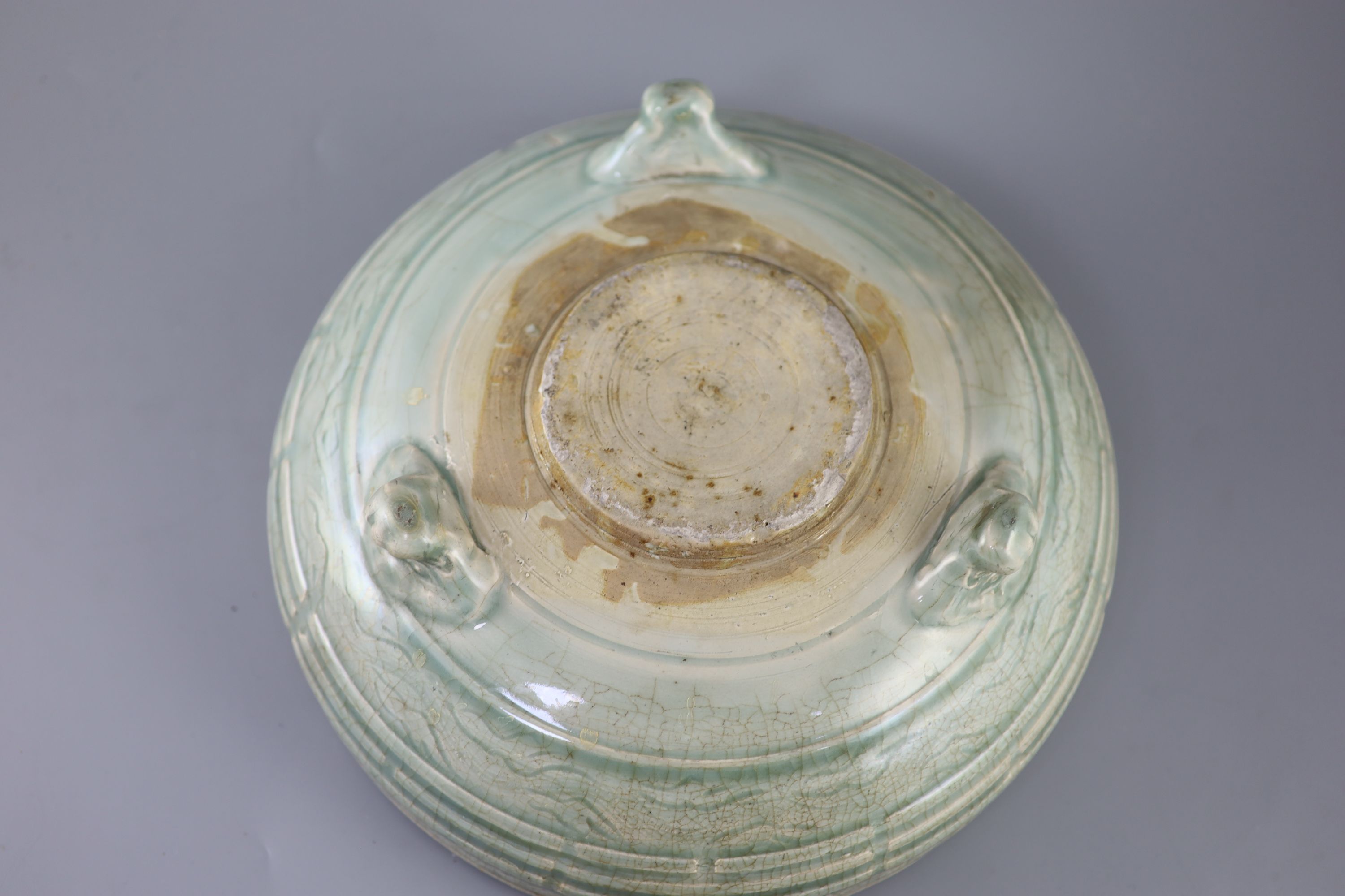 A large Chinese Longquan celadon tripod censer, Ming dynasty, 15th century, 31cm diameter